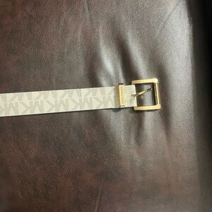 Michael Kors women’s Vanilla MK pattern with Gold Buckle.  New with tags.